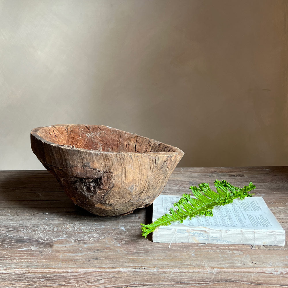 Dating from the early 1900’s wooden root bowls were used across Europe. This wonderfully distressed Antique Root Bowl | Dhara would look great on your countertop.
