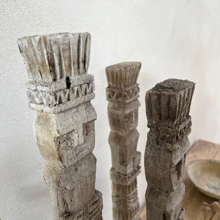 Vintage Balinese wooden statue on stand