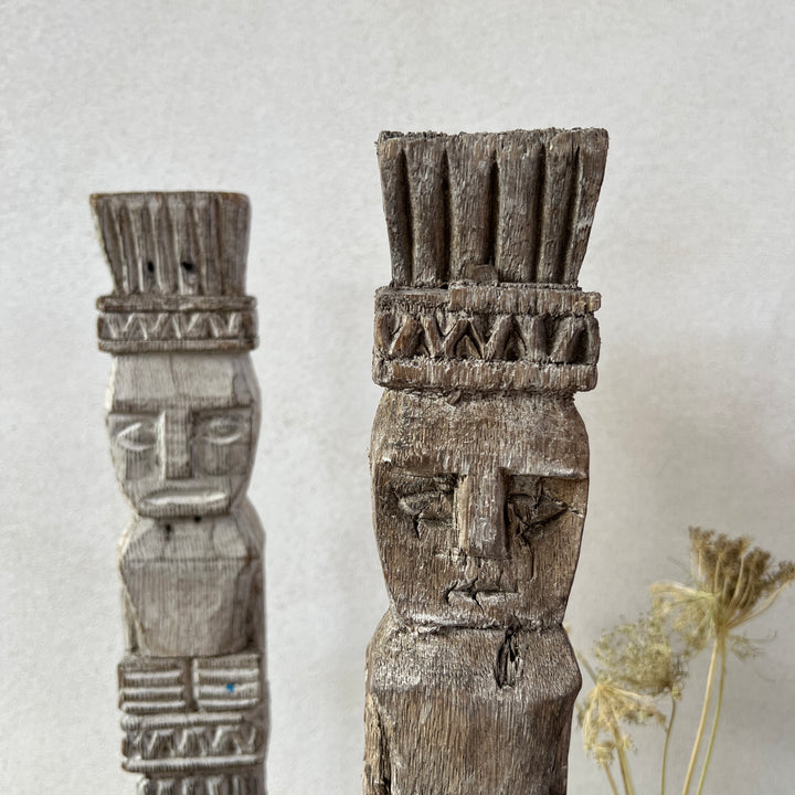 Vintage Balinese wooden statue on stand