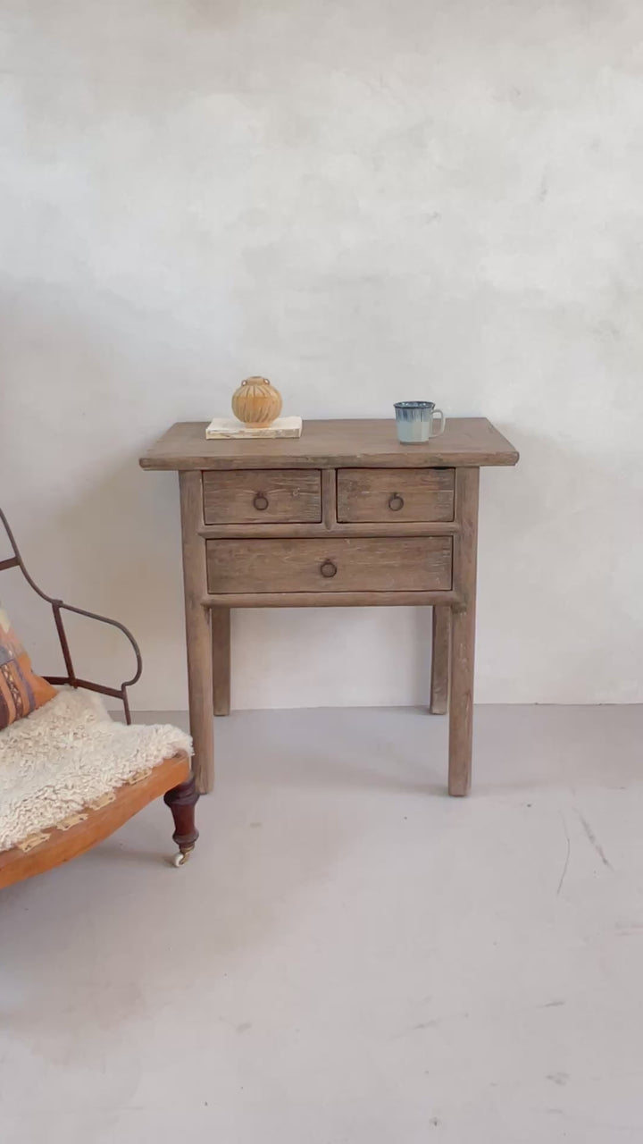 Small antique console table with drawers