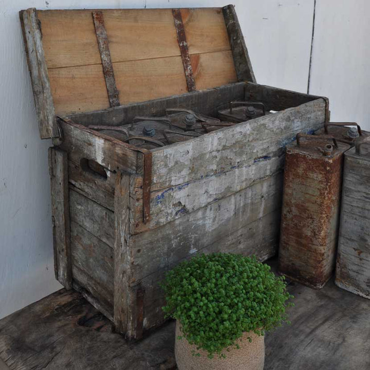 rustic vintage box of galvanised cans