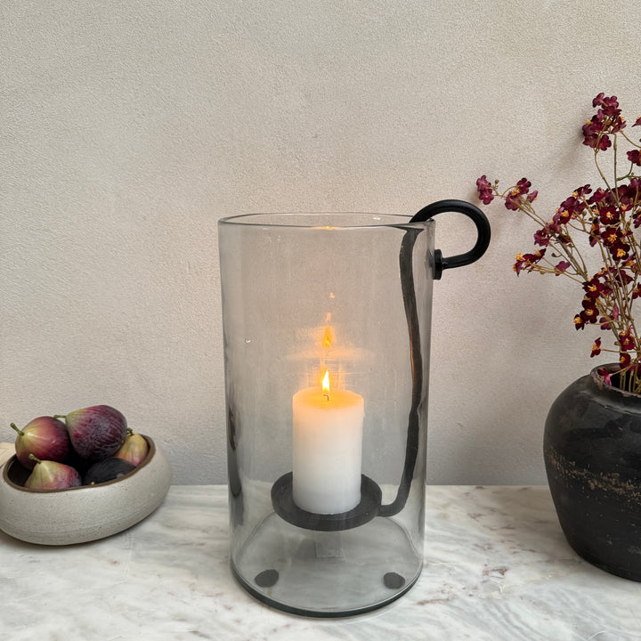Glass hurricane lantern and candle holder