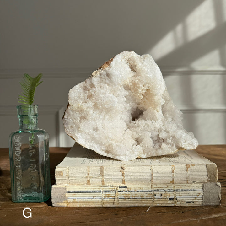 Large geode round rock with crystals