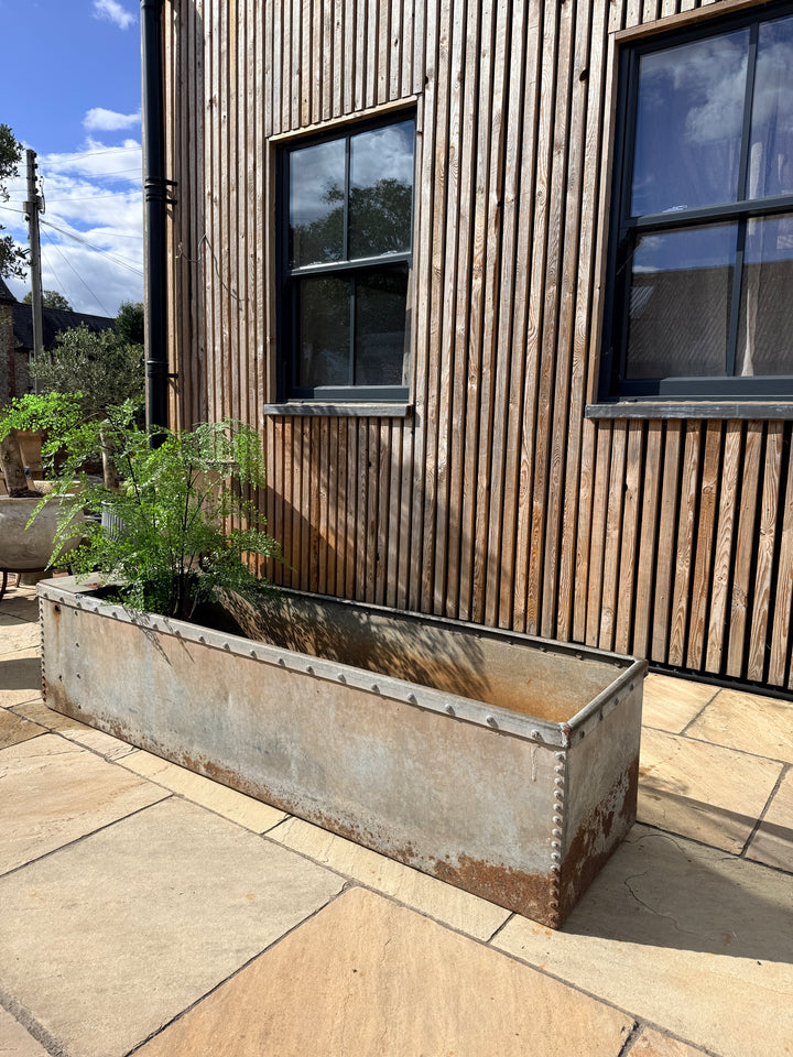 Vintage riveted trough planter
