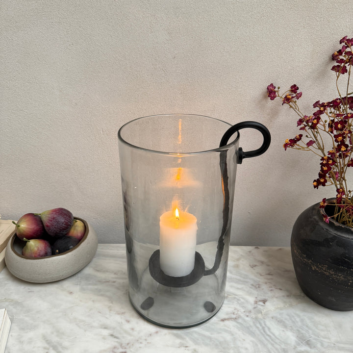 Glass hurricane lantern and candle holder