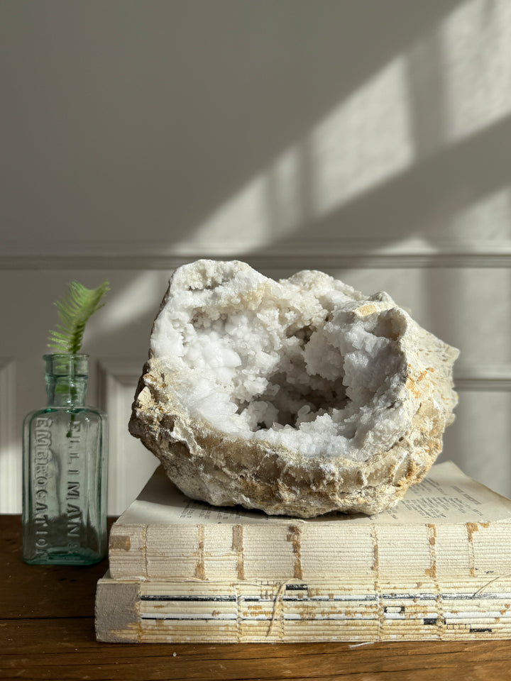 Large geode round rock with crystals