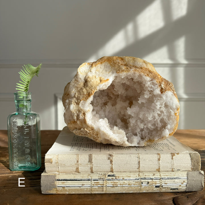 Large geode round rock with crystals