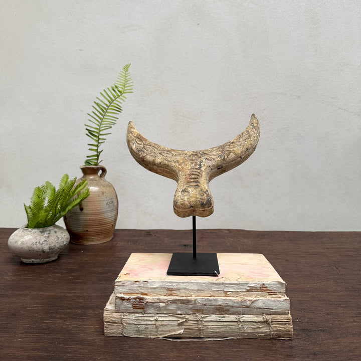 Primitive wooden cow horn sculpture