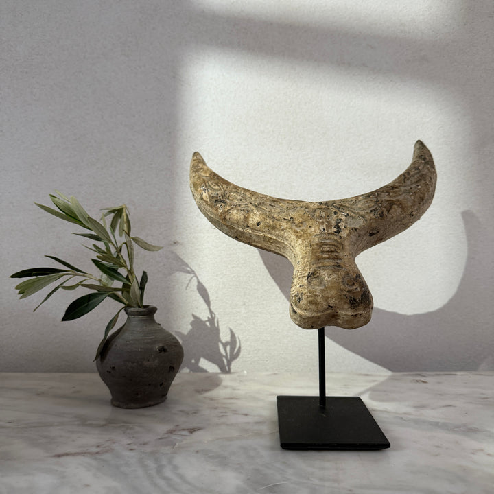 Primitive wooden cow horn sculpture