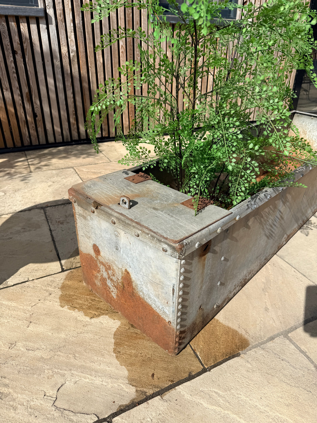Vintage riveted trough planter