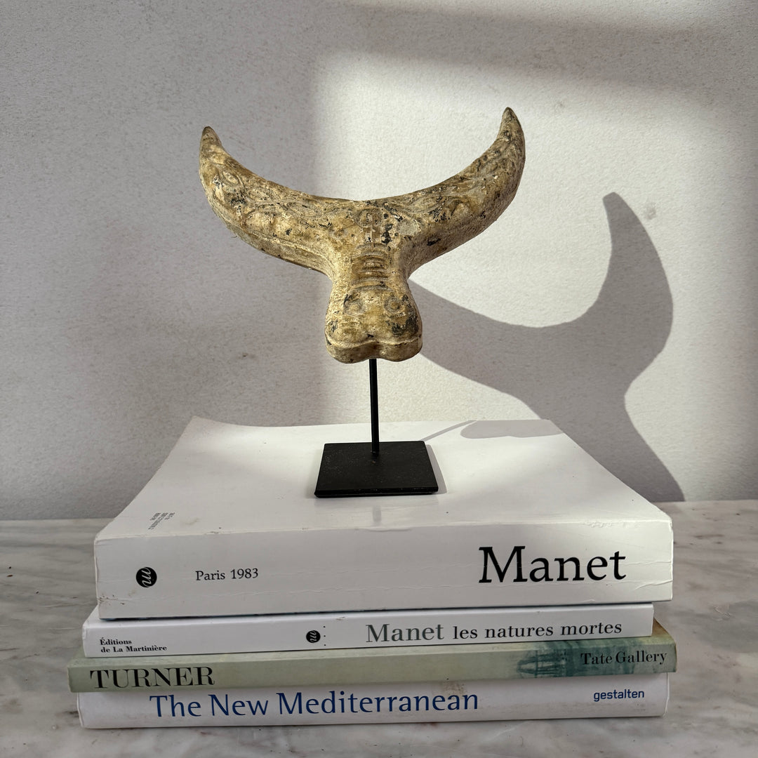 Primitive wooden cow horn sculpture