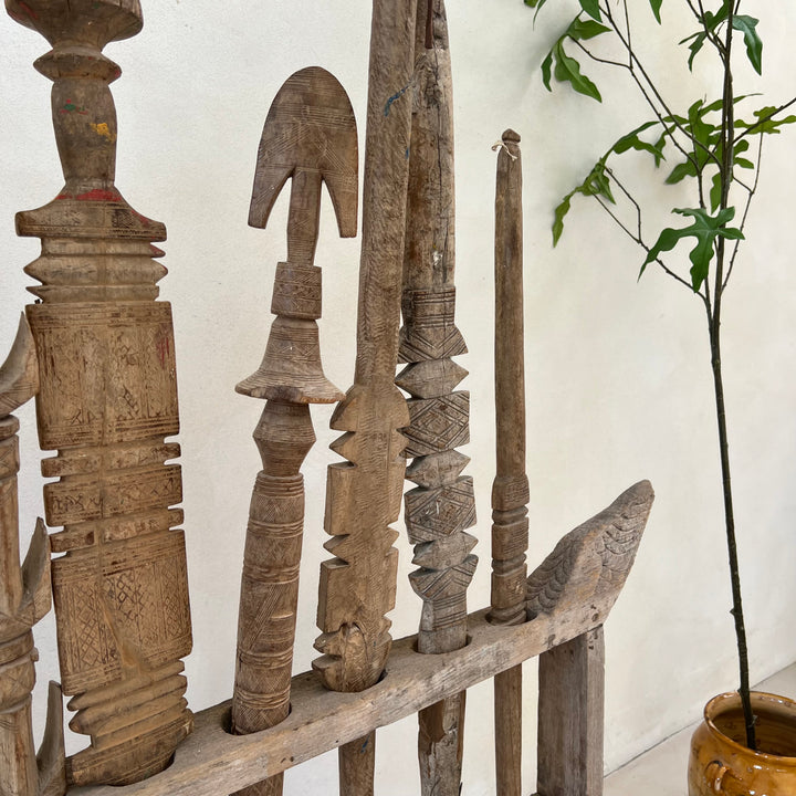 Antique Berber Carved Wooden Tent Peg Collection on Stand