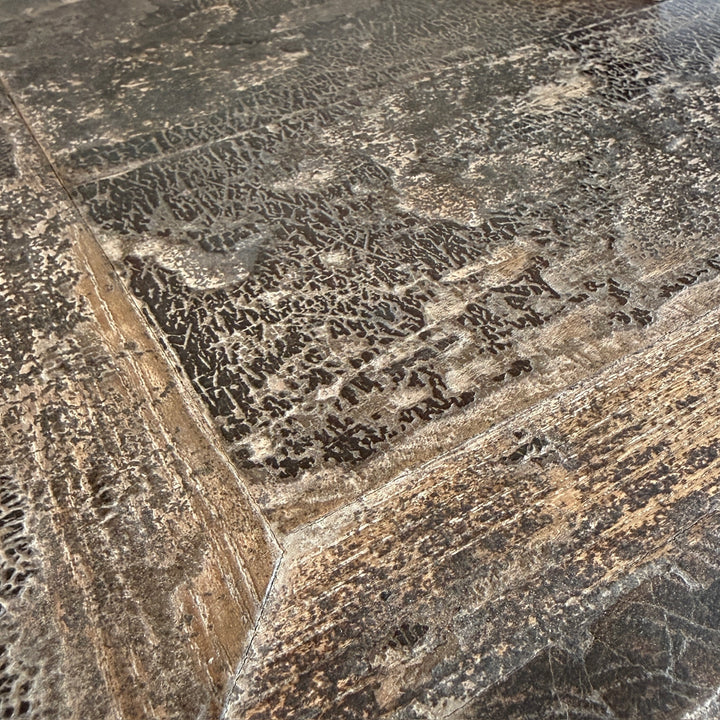 Close-up of a textured stone surface with patterns