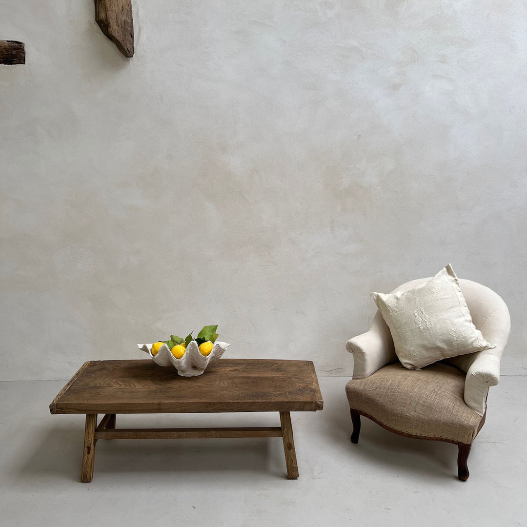 Antique Coffee Table Bisham styled with an armchair