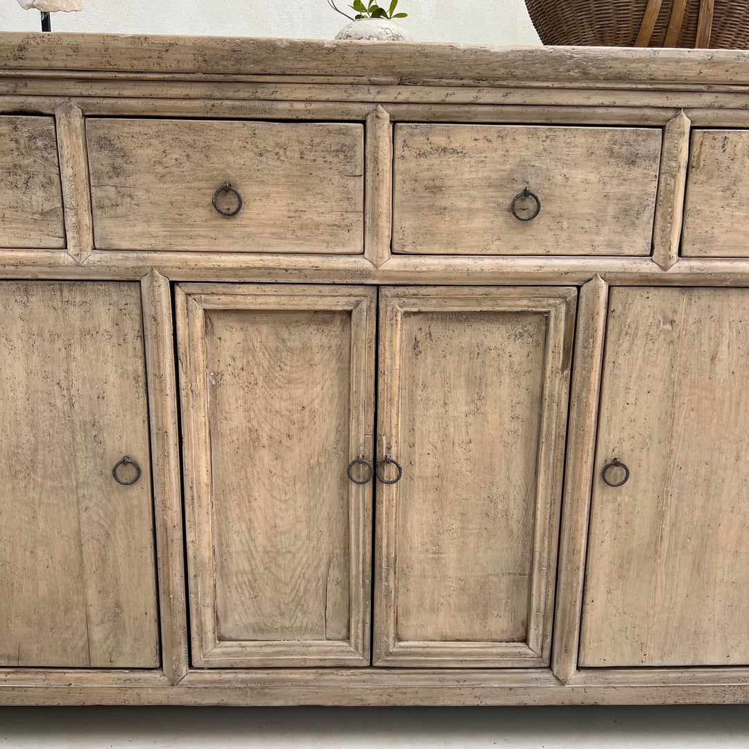 Wooden cabinet with drawers and doors on a white background