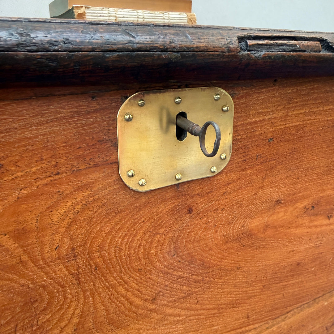 Close-up of the original working lock and key on the Antique Victorian Oak Blanket Box, highlighting authentic Victorian craftsmanship.

