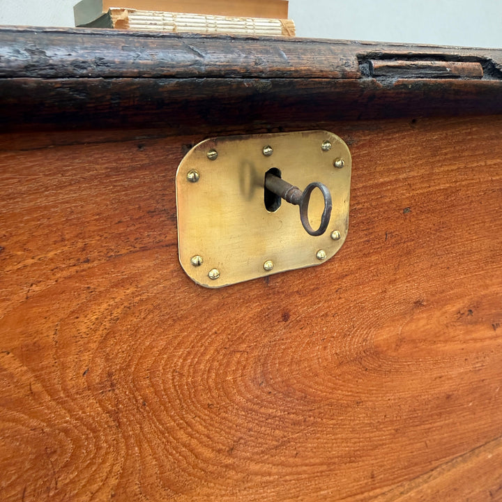 Close-up of the original working lock and key on the Antique Victorian Oak Blanket Box, highlighting authentic Victorian craftsmanship.
