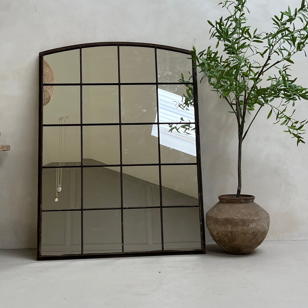 Antique cast iron window mirror | Monpazier used indoors in a home