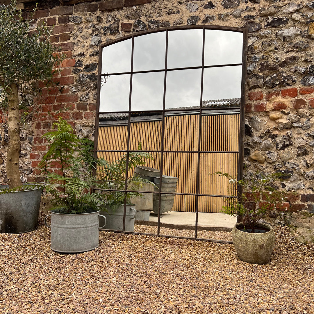 Antique cast iron window mirror | Monpazier used outdoors in a garden
