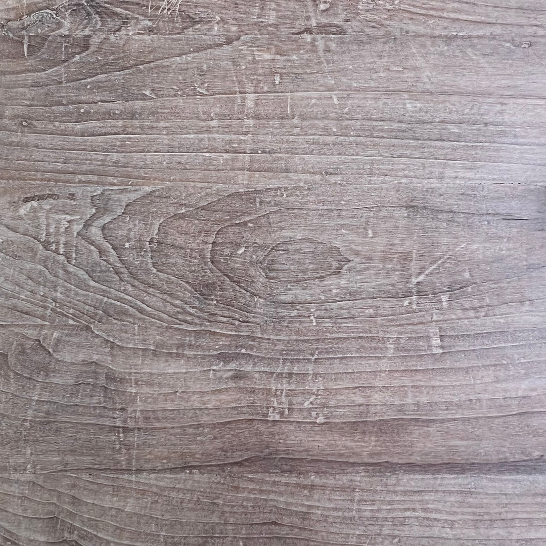Close-up of a wooden surface with visible grain and texture
