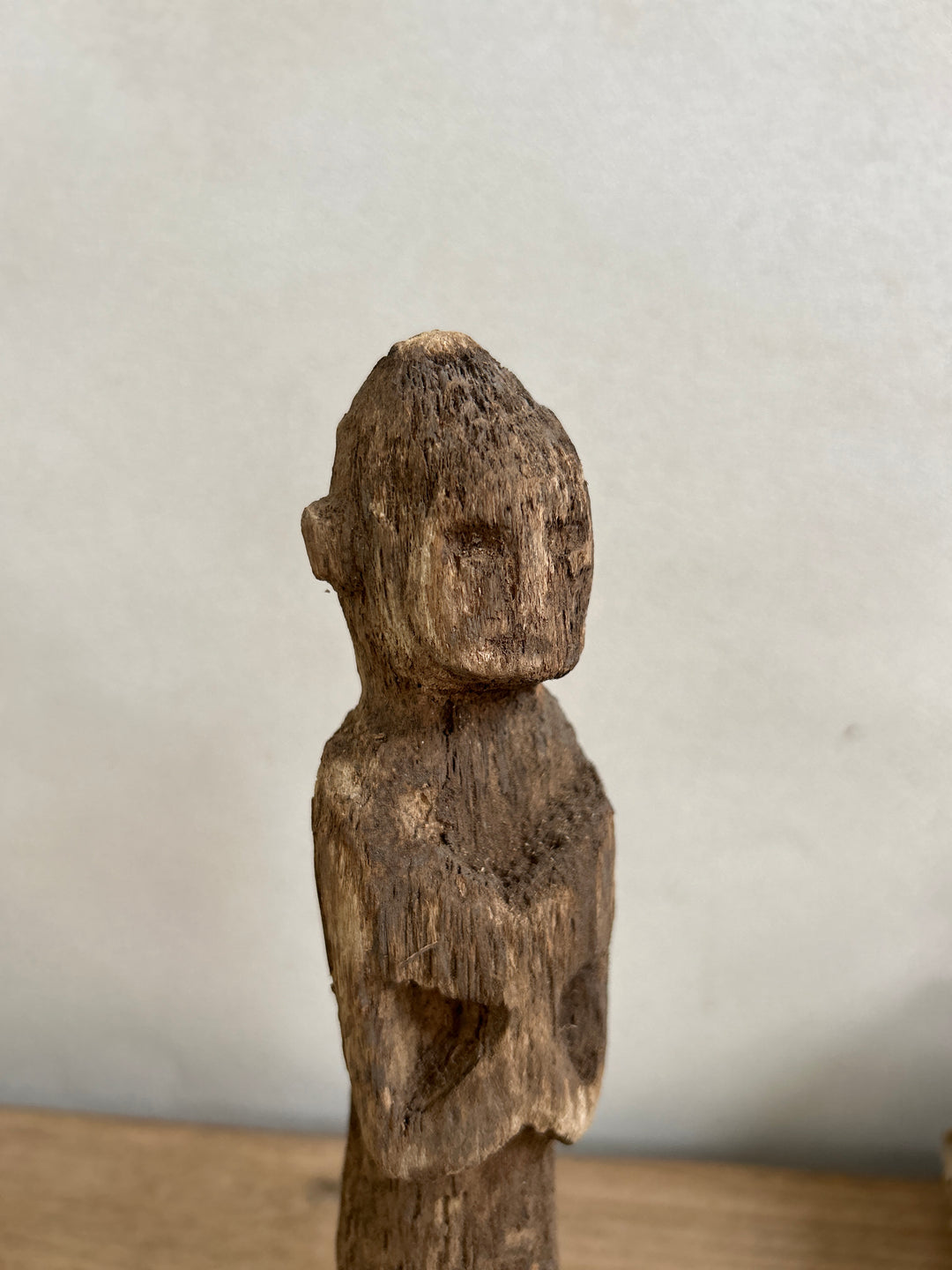 Antique hand-carved wooden statues on stand | Wira
