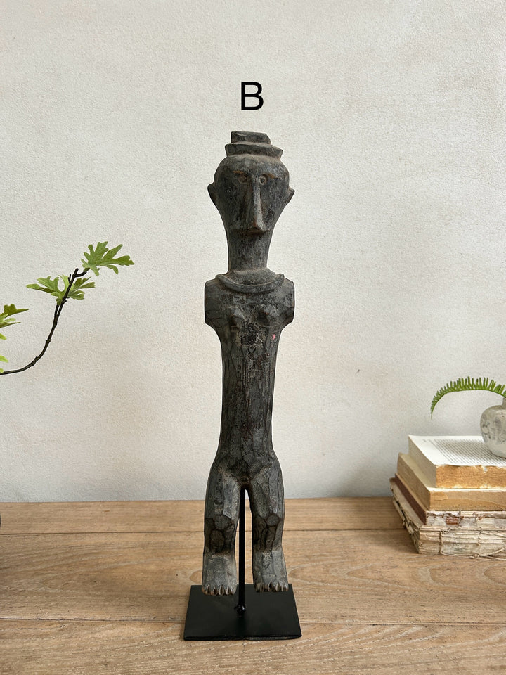 Antique hand-carved wooden statues on stand | Wira 
