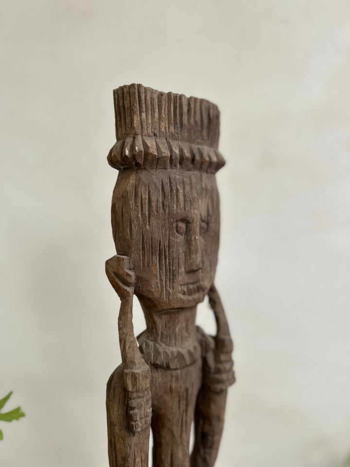 Antique hand-carved wooden statues on stand | Wira