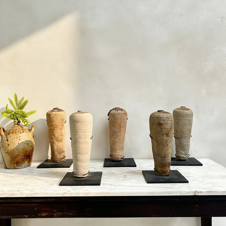 Antique mercury vessel on stand