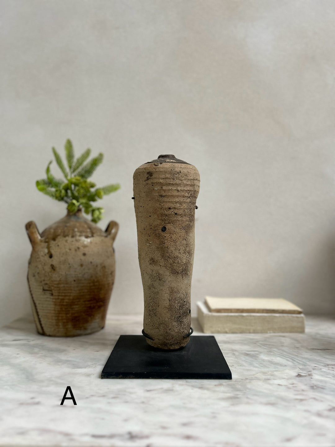 Antique mercury vessel on stand