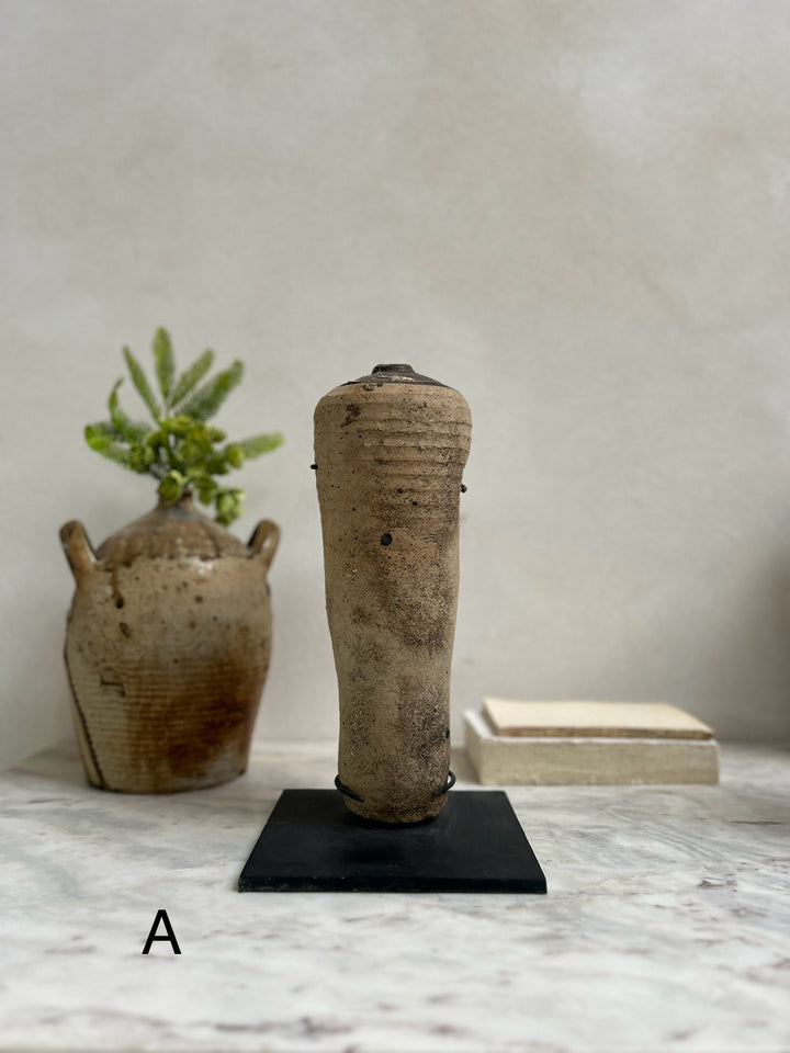 Antique mercury vessel on stand