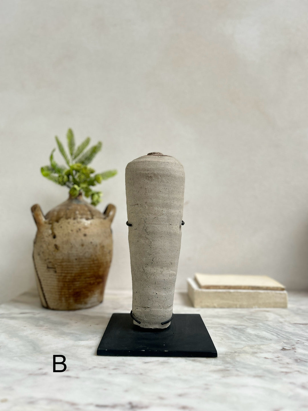 Antique mercury vessel on stand