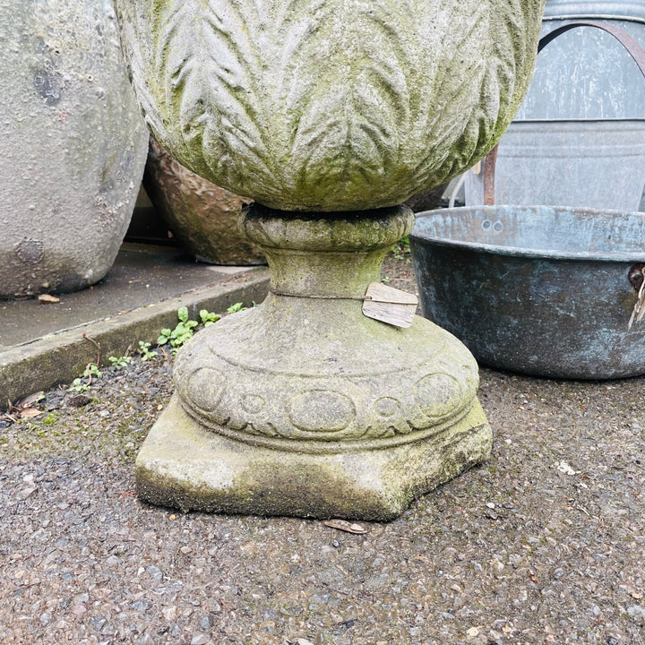 Antique stone garden urn detail