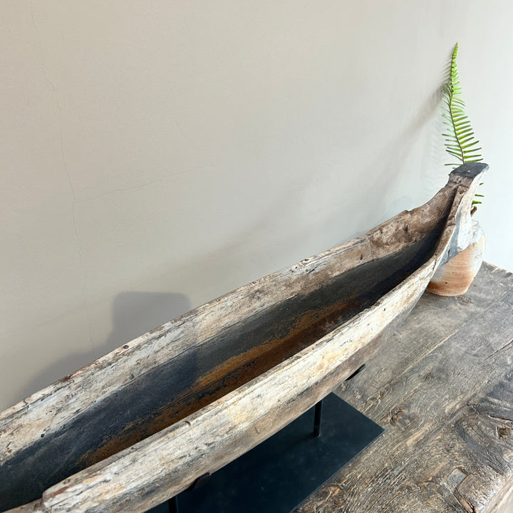 Antique wooden boat on stand | Krishna