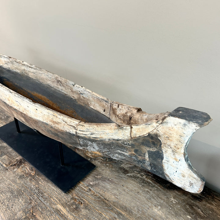 Antique wooden boat on stand | Krishna