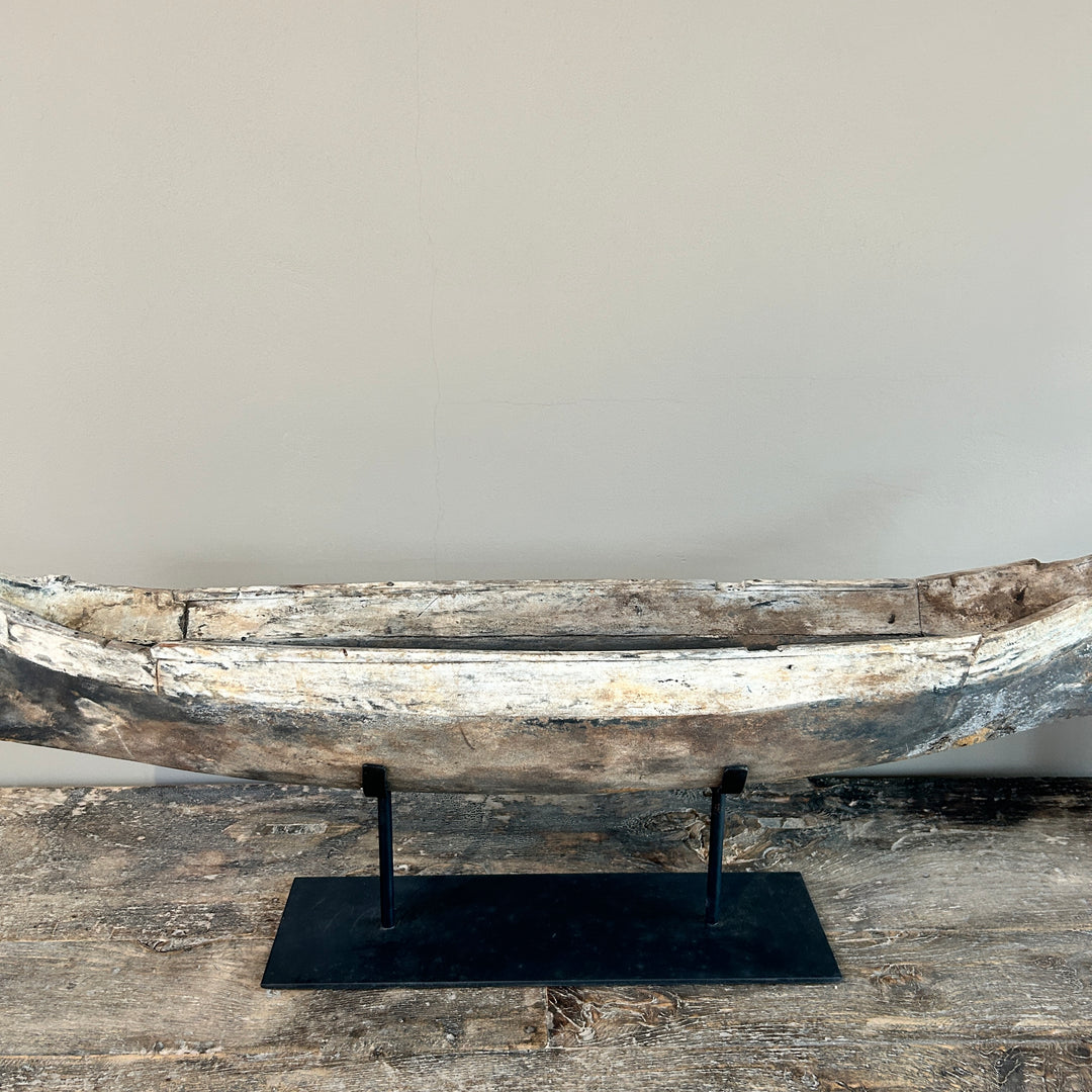 Antique wooden boat on stand | Krishna