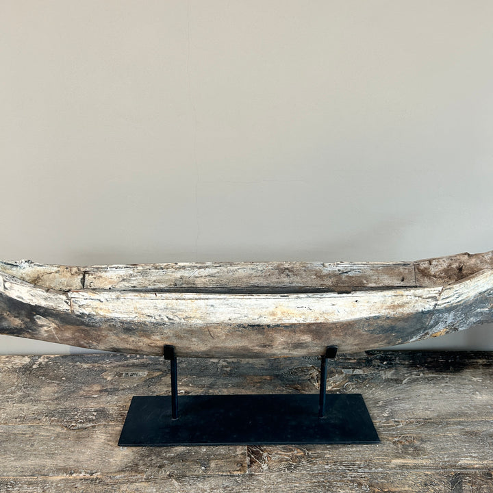 Antique wooden boat on stand | Krishna