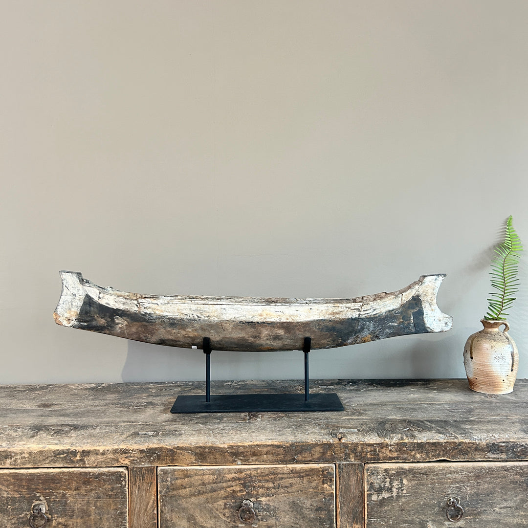 Antique wooden boat on stand | Krishna