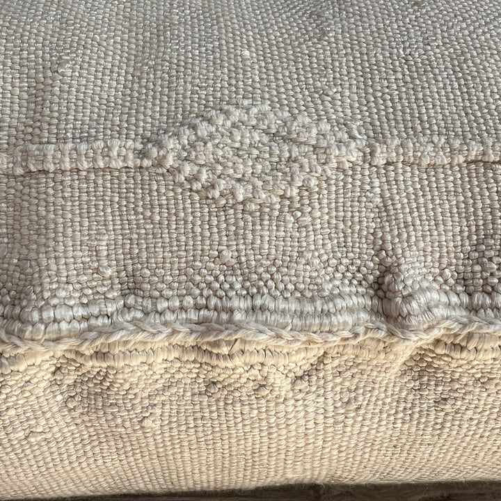 Beige cactus silk cushion stitching detail