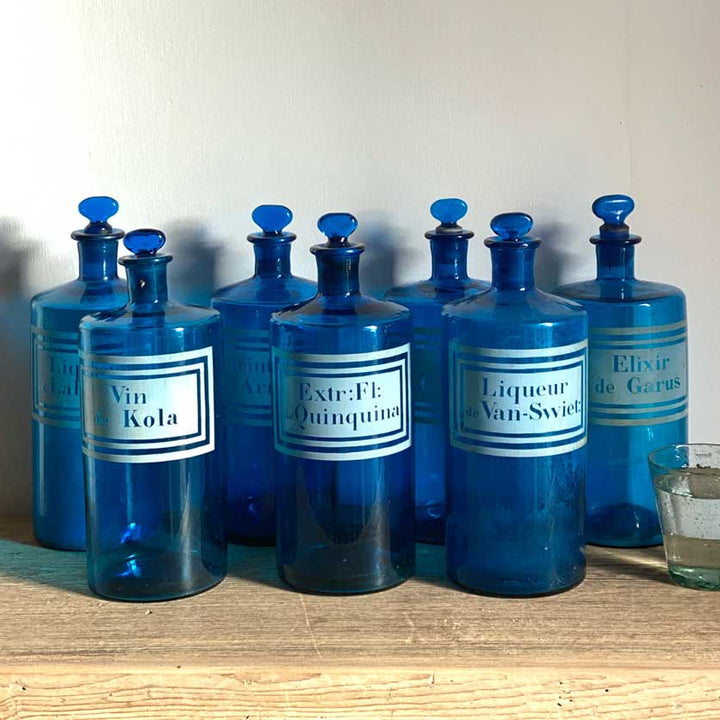 Antique blue apothecary bottles