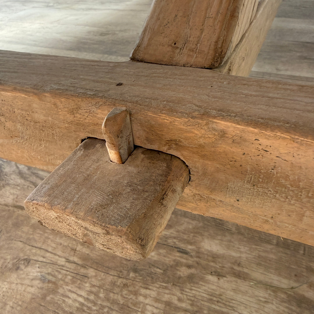 Close up of traditional peg and tenon on st the end of the stretcher bar in our traditionally constructed Cambridge table 