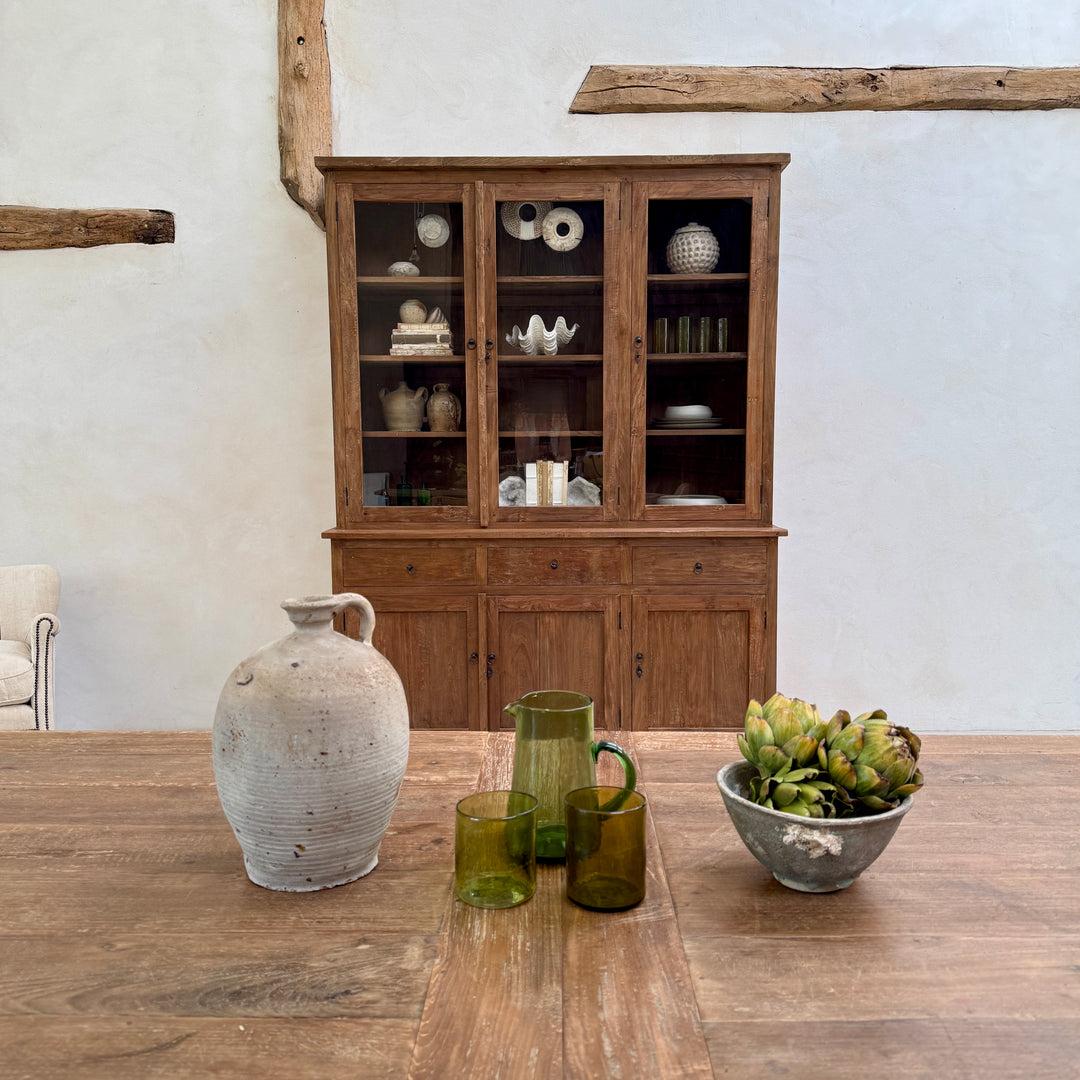 Eton reclaimed teak glazed dresser cabinet styled in a dining room with contemporary country interiors and solid reclaimed teak furniture.