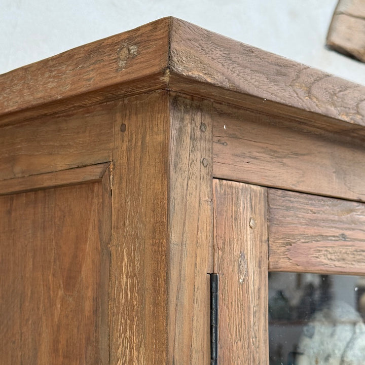 Close-up of the Eton reclaimed teak glazed cabinet showing handcrafted joinery, rich reclaimed timber grain and solid wood construction.