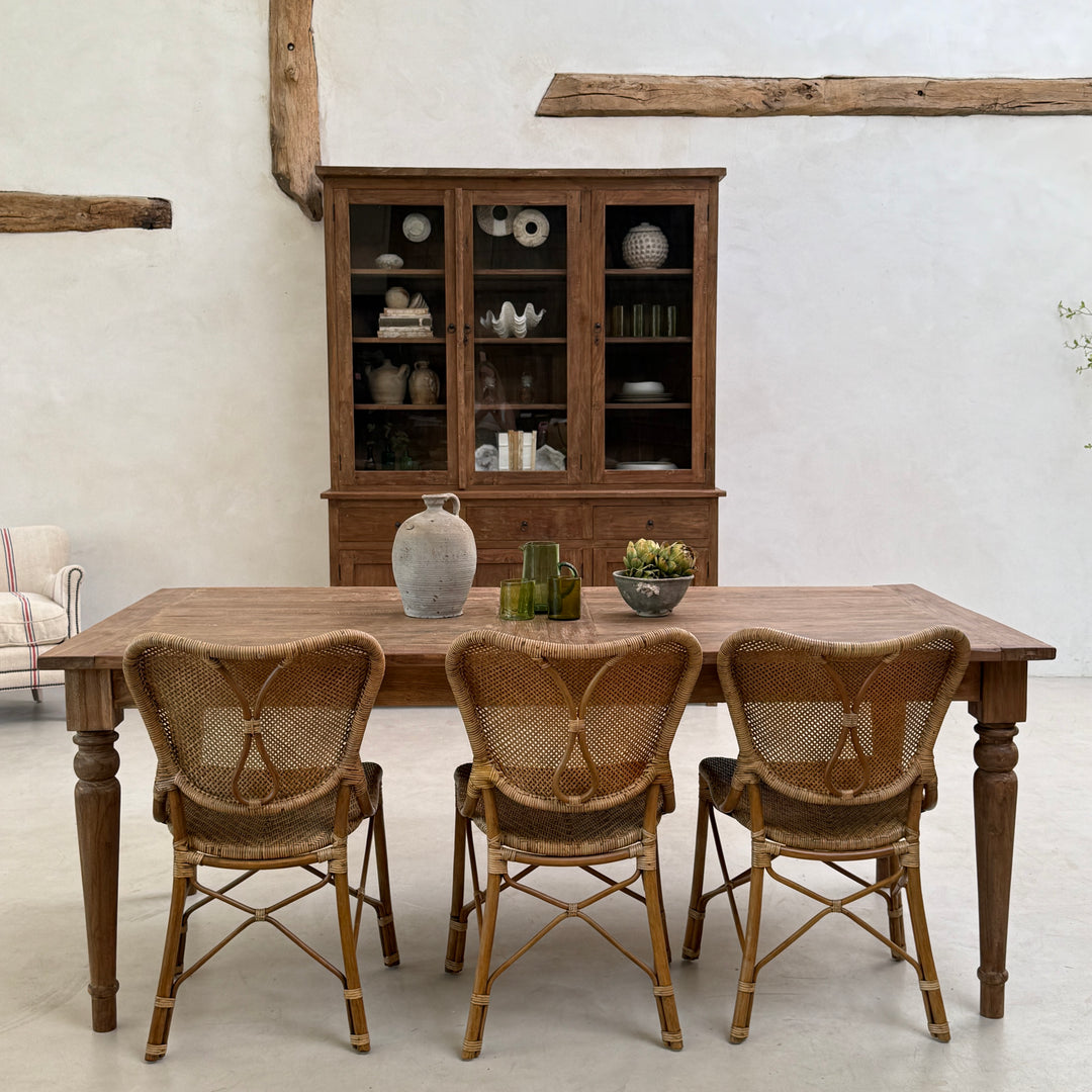 Eton reclaimed teak glazed cabinet paired with a reclaimed teak dining table to create a coordinated contemporary country dining room.