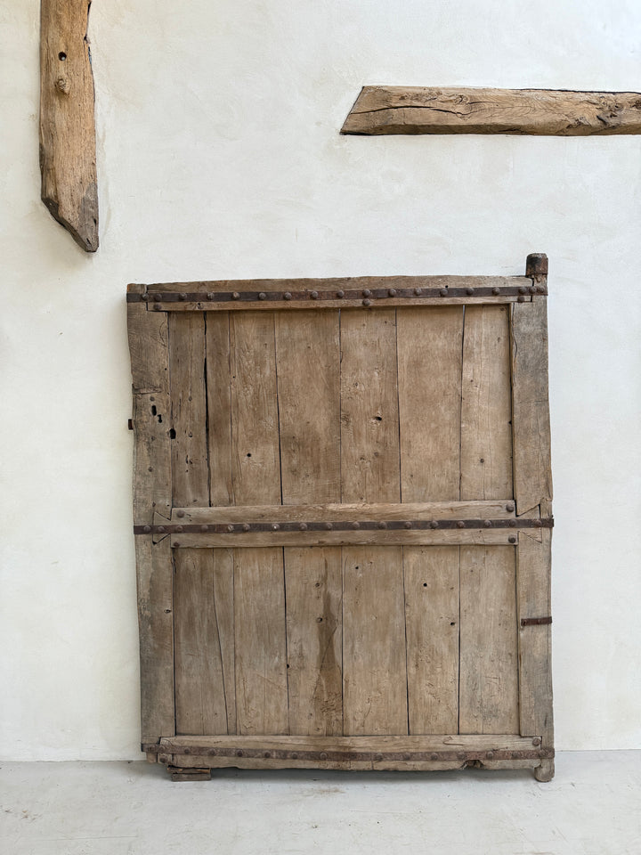Vintage wooden crate on a white wall