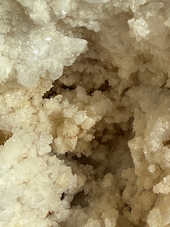 Large geode round rock with crystals