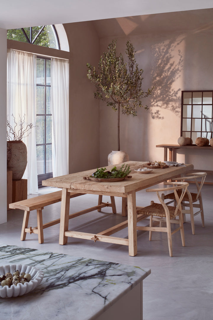 Hand Crafted Salvaged Dining Table from the side in a dining room