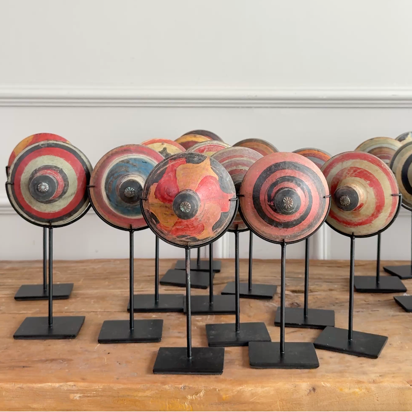 Decorative hand painted wooden spnning tops.