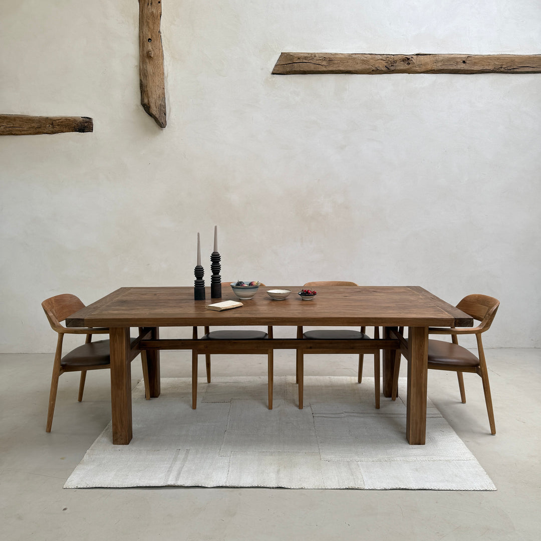 Henley reclaimed teak dining table with clean architectural lines and solid salvaged teak construction, perfect for contemporary and country interiors.