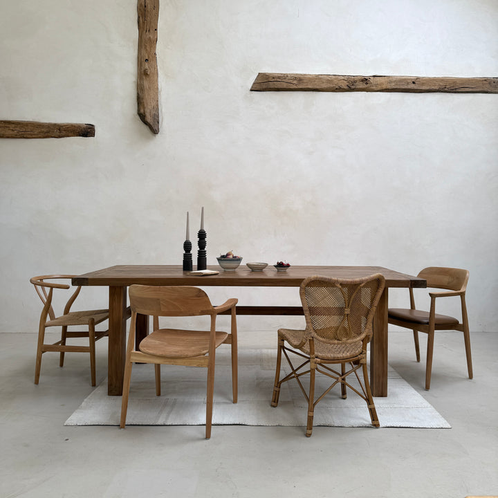 Henley reclaimed teak dining table showing the beautifully weathered tabletop with rich grain, natural knots and authentic reclaimed timber character.