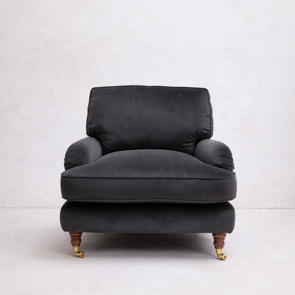 Dark gray armchair on a white background